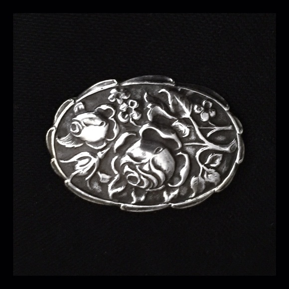Antique Jewelry - Antique silver repousse brooch